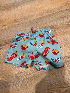 Cat & Jack Light Blue Swim Trunks with Red Crab Print